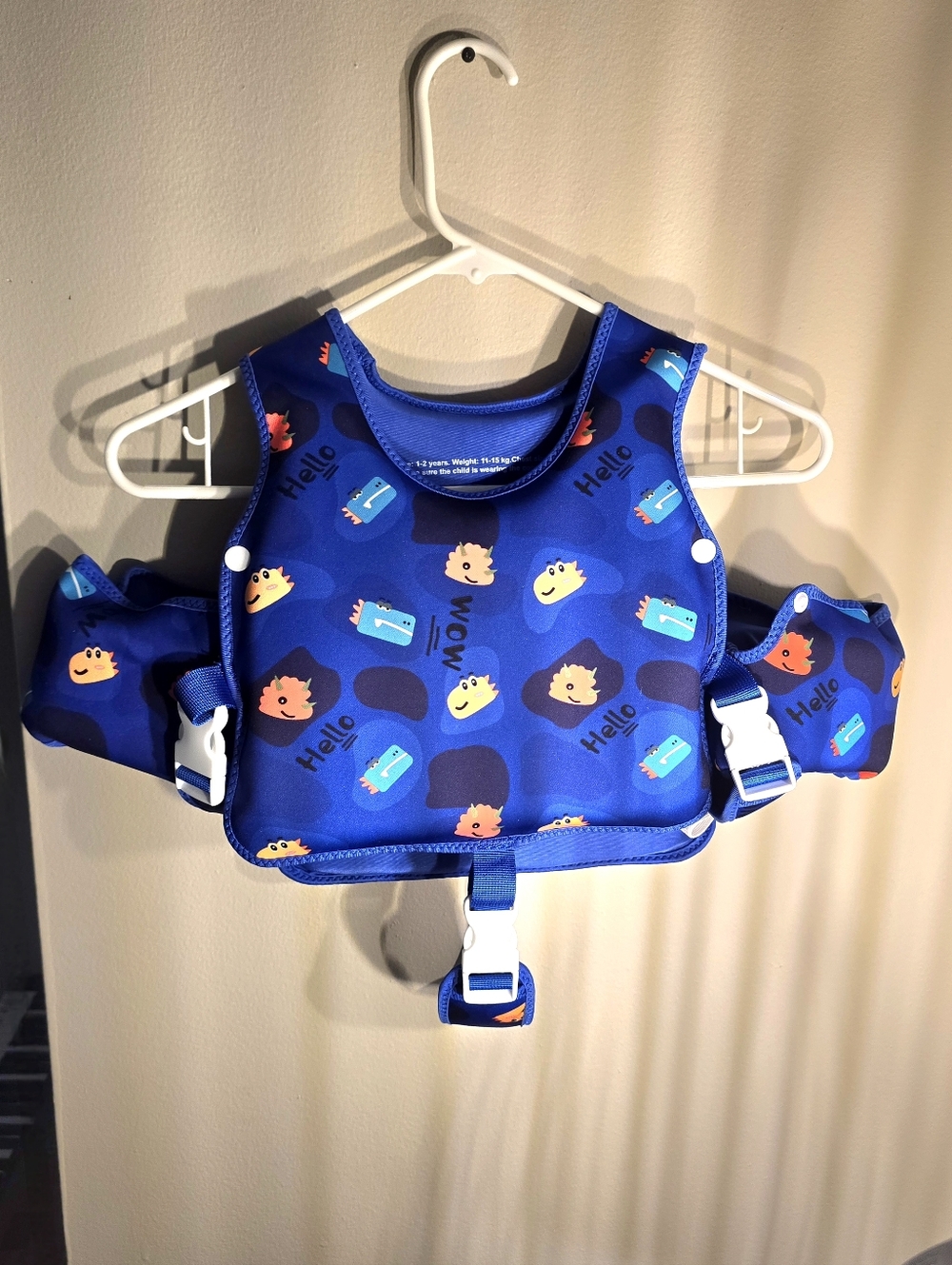 Brand New  Childrens Blue Swim Vest with Fun Animal Print. Removable Arm Floats
